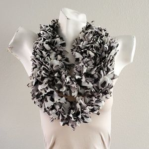 Black, white, and gray leopard print ruffle infinity scarf.